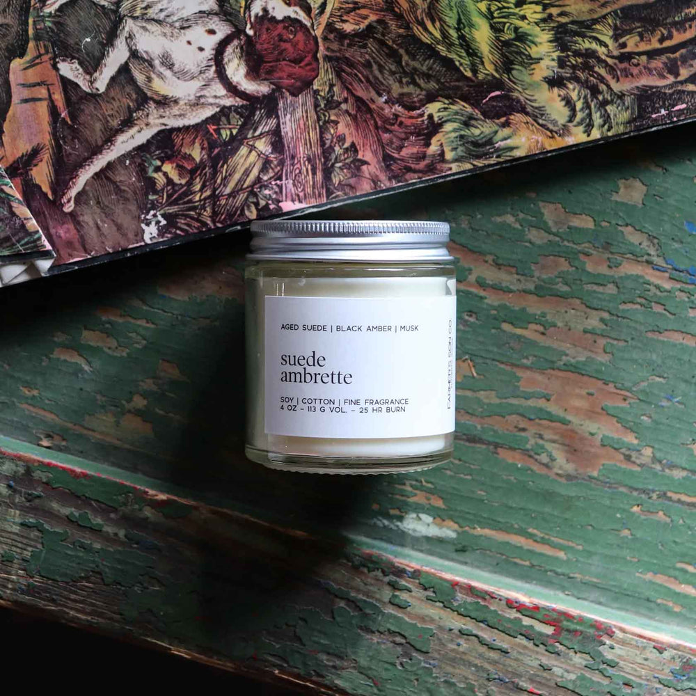 Suede ambrette 4oz scented candle from Farmer's Son Co.