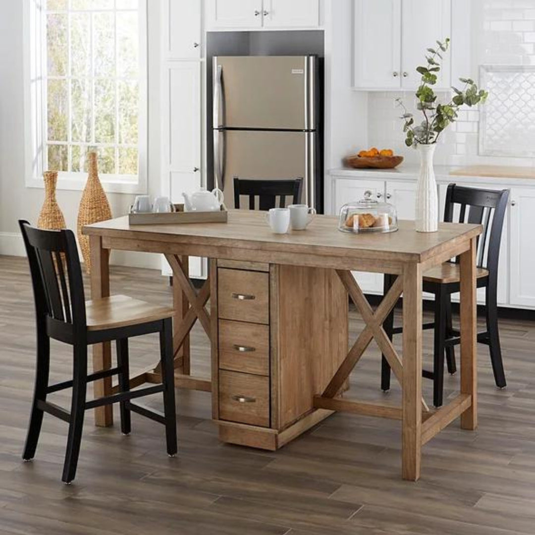 Kitchen island with three chairs and fridge behind them