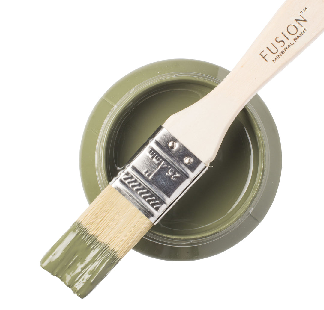 Deep muted olive green paint can and brush from Fusion Mineral Paint