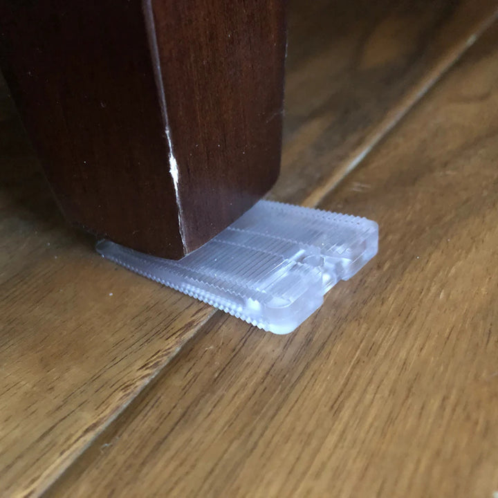 Wobble Wedge - Clear Rigid floor protector under chair leg