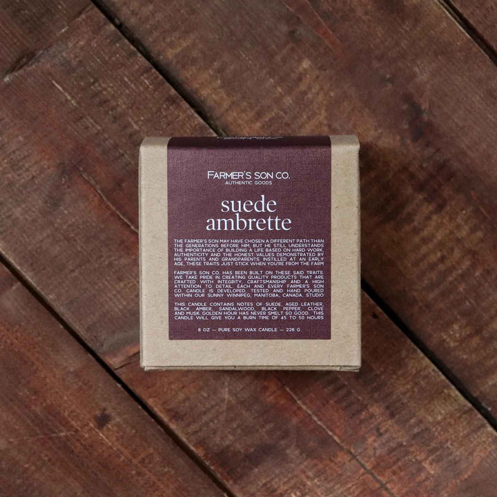 Suede ambrette 8oz scented candle from Farmer's Son Co.