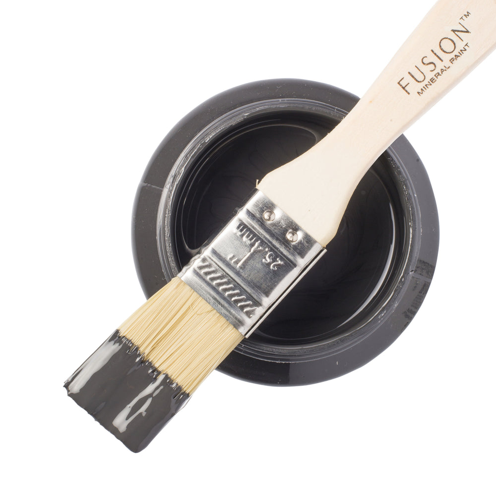 Dark charcoal grey paint can and brush from Fusion Mineral Paint