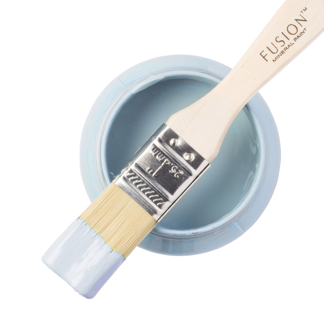 Periwinkle blue paint can and brush from Fusion Mineral Paint